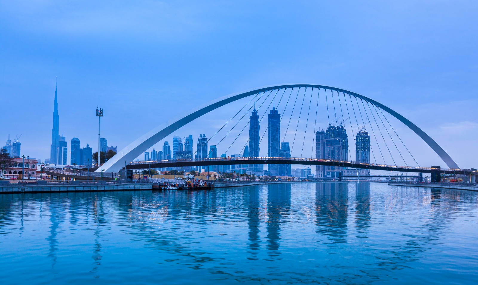 Tolerance Bridge — Dubai Water Canal at blue hour